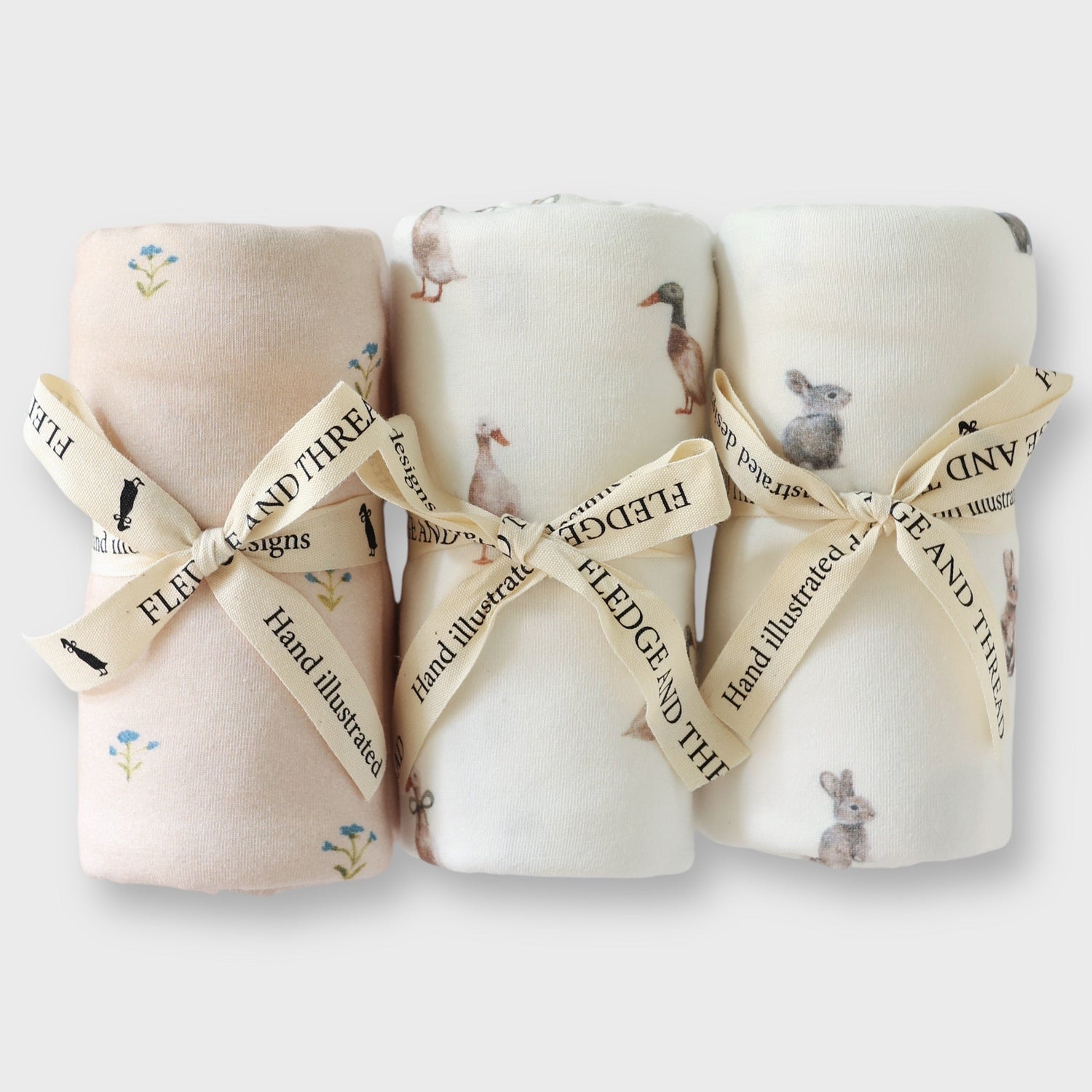 Soft stretch cotton baby swaddle and baby wrap, designed in Australia. Breathable and lightweight, perfect for newborns, prams, and baby gifting.