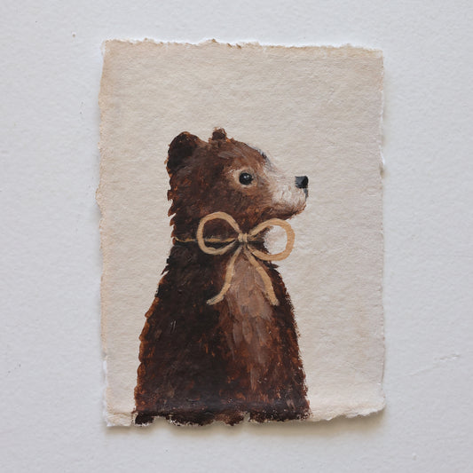 Bear with mustard bow