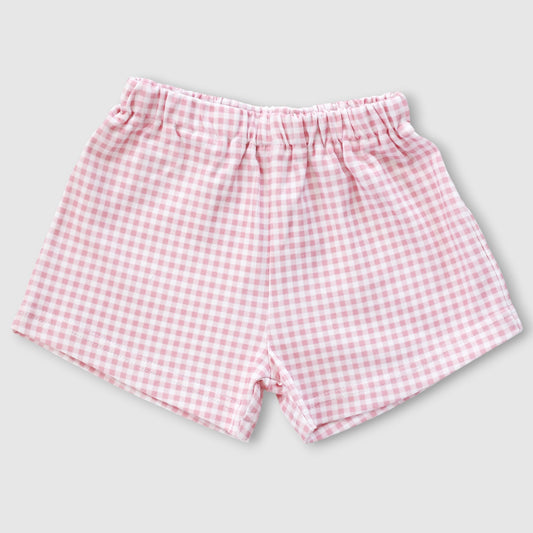 Pink and white gingham checkered baby shorts with an elastic waistband, shown flat on a light gray background.